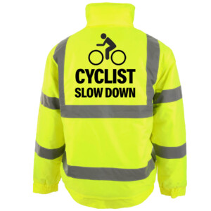 Cyclist slow down yellow bomber jacket